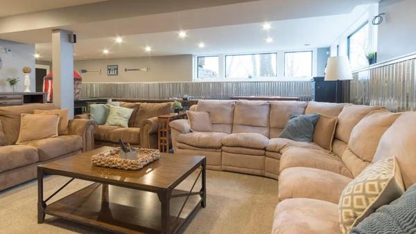Interior living room with large sectional sofas